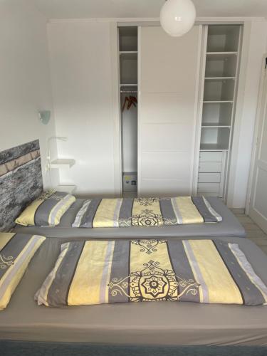 Postel nebo postele na pokoji v ubytování Residencia MIRAPUERTO