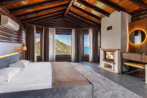 Postel nebo postele na pokoji v ubytování Assos Kartal Yuvasi Hotel