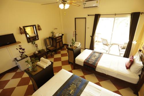 Ένα ή περισσότερα κρεβάτια σε δωμάτιο στο Liam's Guesthouse Adults Only