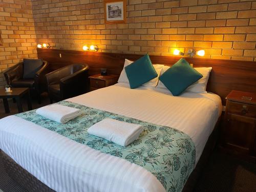 Postel nebo postele na pokoji v ubytování City View Motel