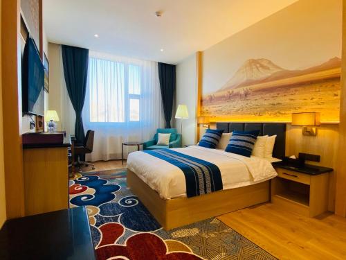 Postel nebo postele na pokoji v ubytování Mazaalai Hotel