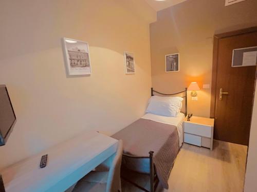 Postel nebo postele na pokoji v ubytování Hotel Belsito Wellness & Spa