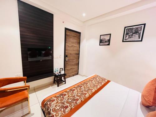 Cama o camas de una habitación en Hotel The Savode - Just 2 Mins From Golden Temple Amritsar