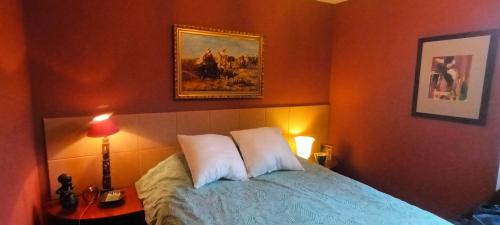 Ένα ή περισσότερα κρεβάτια σε δωμάτιο στο maison MON REVE