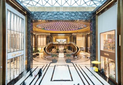 a view of the lobby of a shopping mall at Riggae Tower Hotel in Kuwait