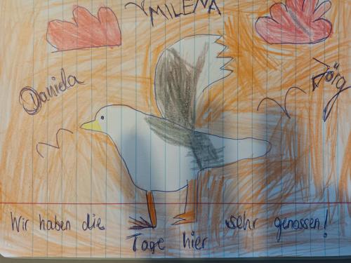 a drawing of a bird on a wooden wall at Genieten van de Vlaamse kust met prachtig zeezicht in De Haan
