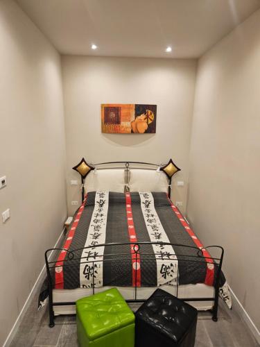 Кровать или кровати в номере Maison Michelle - appartamento ammobiliato IMOLA