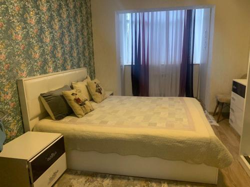 Ένα ή περισσότερα κρεβάτια σε δωμάτιο στο Dream Home