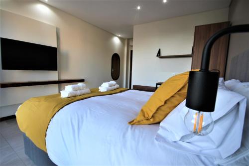 Katil atau katil-katil dalam bilik di Oryx Boutique Hotel