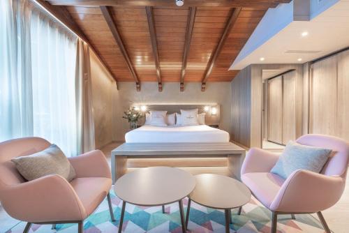 Postel nebo postele na pokoji v ubytování Grand Plaza Hotel & Wellness