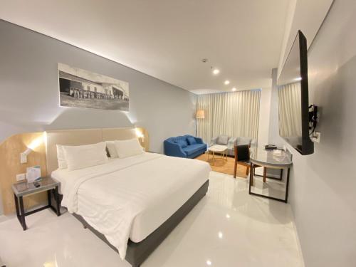 Cama o camas de una habitación en THE 1O1 Malang OJ
