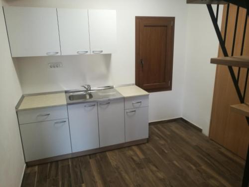 Virtuvė arba virtuvėlė apgyvendinimo įstaigoje apartma Burjuca
