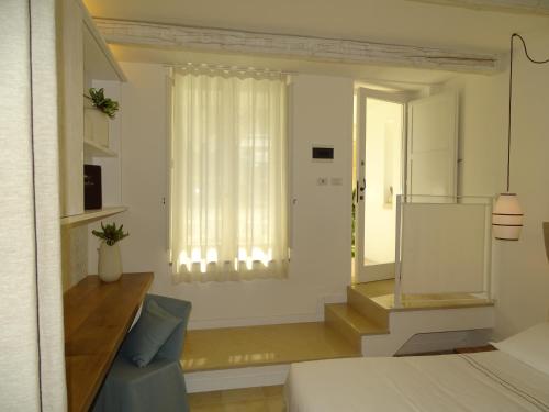Katil atau katil-katil dalam bilik di Masseria Bandino & Spa