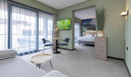 Postel nebo postele na pokoji v ubytování Fletcher Hotel-Restaurant Marknesse
