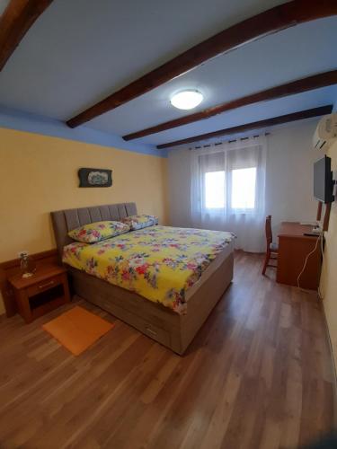 Llit o llits en una habitació de Bed and Breakfast Lovac