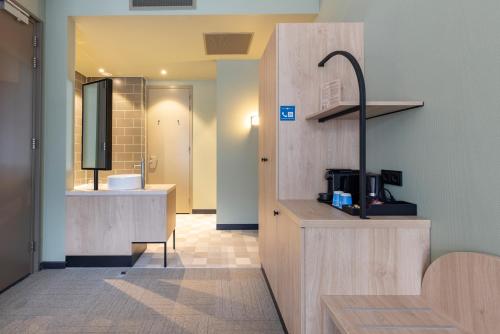 Kuchyň nebo kuchyňský kout v ubytování Fletcher Hotel-Restaurant Marknesse