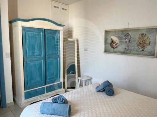 En eller flere senge i et værelse på Villa Gaios - Piscina Privata By Cala Salento