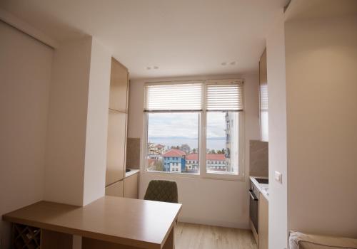 Kuchyň nebo kuchyňský kout v ubytování Tola Apartaments