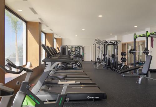 a gym with a row of tread machines at H10 Atlantic Sunset Horizons Collection in Adeje