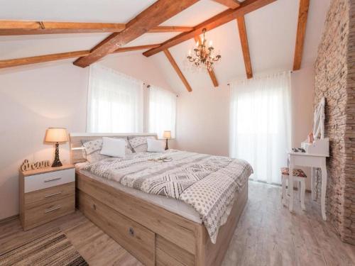 Postel nebo postele na pokoji v ubytování Apartman Bella Vista