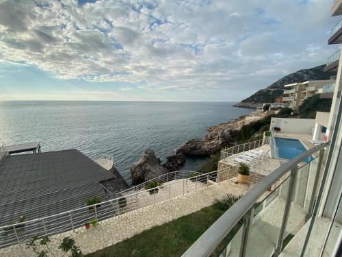 a view of the ocean from the balcony of a house at Paradise beachfront view 2 in Dobra Voda