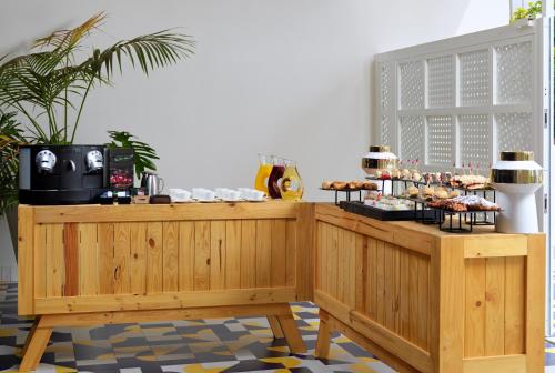 a buffet with pastries and desserts on a table at H10 Atlantic Sunset Horizons Collection in Adeje