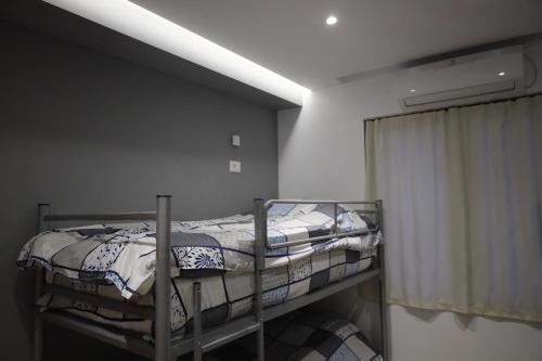 Postel nebo postele na pokoji v ubytování Sonche Hostel