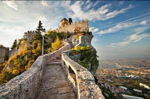 a view of a castle on top of a mountain at Hotel La Rocca in San Marino