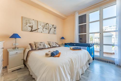 Postel nebo postele na pokoji v ubytování Townhouse beachside Fuengirola