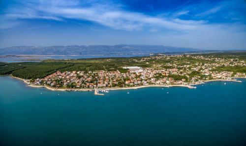 an aerial view of a small island in the water at Modern Apartment in Vrsi, 45 m², spacious terrace in Vrsi