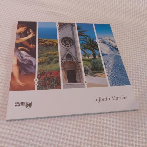 a card with four pictures of the eiffel tower at AURUM Affittacamere in Loreto