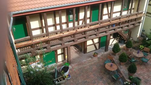 an overhead view of a building with a patio at Hotel Inselhof in Malchow