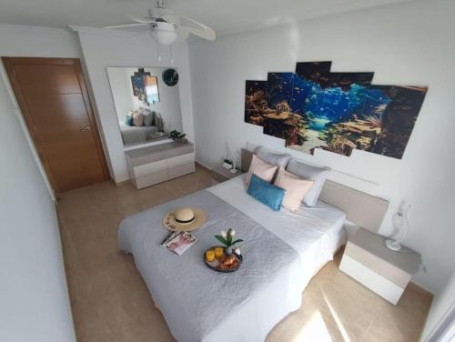 Postel nebo postele na pokoji v ubytování Playa Príncipe. La Manga del Mar Menor