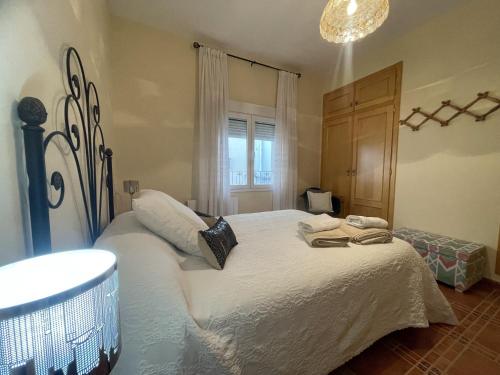 A bed or beds in a room at Casa Veva - Siles