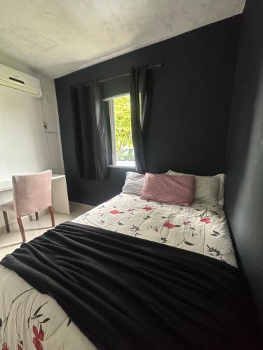 Postel nebo postele na pokoji v ubytování Casa na Grande Florianopolis