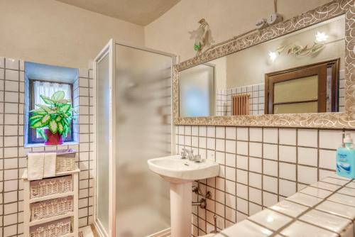 Ett badrum på Maison Enchantée