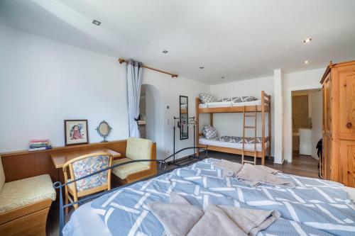A bed or beds in a room at Haus Reimon Apt Reinhard