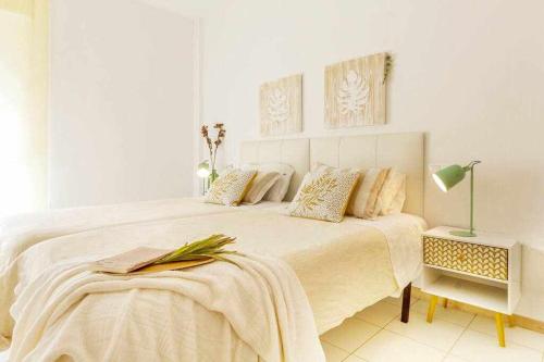 Postel nebo postele na pokoji v ubytování Apartamento Pink VistaBella Sunrise