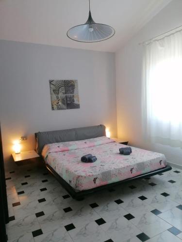 Una cama o camas en una habitación de Casa Jason con vista