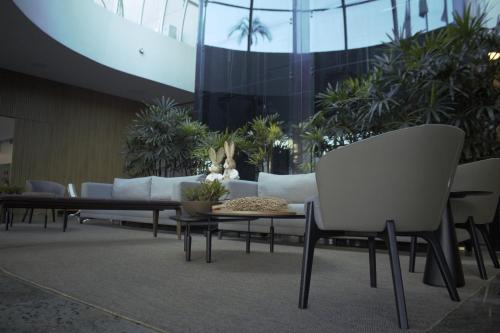 Ruang duduk di San Diego Suites Ipatinga
