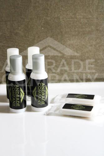 a group of three bottles of hair products on a table at Casa da Padaria Antiga 2 in Pinhão