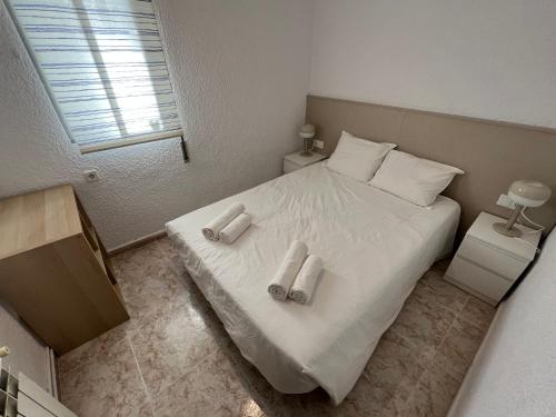 Krevet ili kreveti u jedinici u okviru objekta La Carmeta Apartament