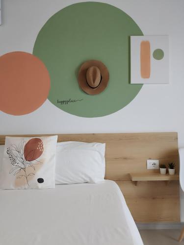 Postel nebo postele na pokoji v ubytování Iris Apartments Ksamil
