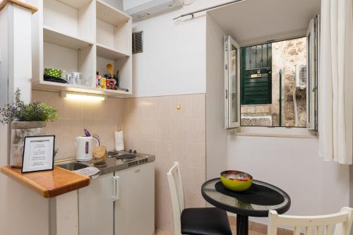 Kuchyňa alebo kuchynka v ubytovaní Guest House Tomasi