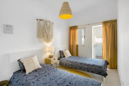 Postel nebo postele na pokoji v ubytování Your Dream Island Escape Starts Here - Casa Tilda