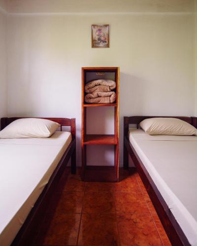Ein Bett oder Betten in einem Zimmer der Unterkunft Hostel Cattleya - Monteverde, Costa Rica
