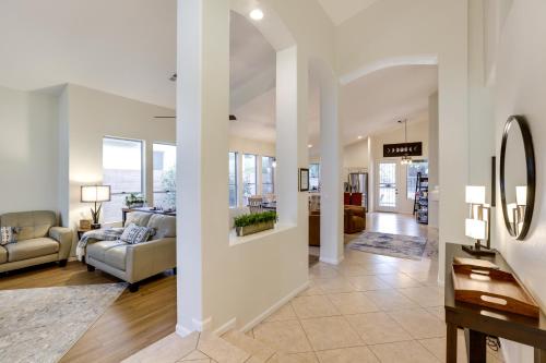 a living room with a couch and a table at Upscale Cave Creek Home with Private Pool and Spa! in Cave Creek