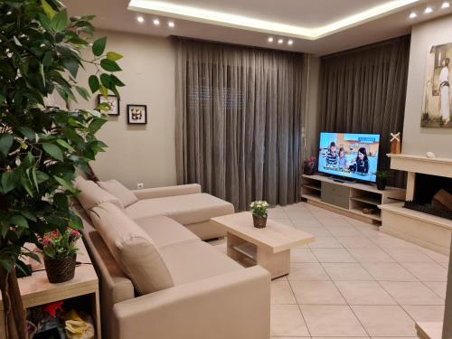 TV a/nebo společenská místnost v ubytování Toroni Pearl
