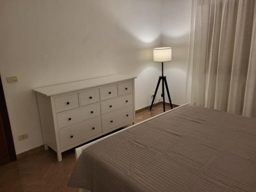 Cama o camas de una habitación en MarSaline Apartment- Zona Centrale