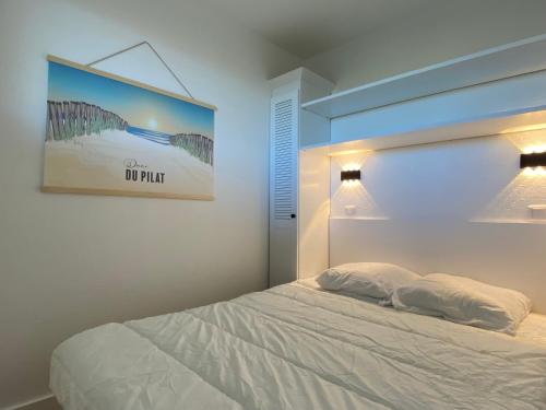 Posteľ alebo postele v izbe v ubytovaní Appartement Cosy en Bord d'Océan